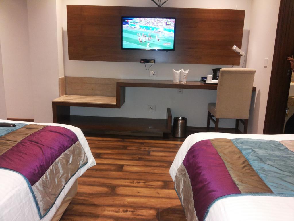 La Sagrita Hotel New Delhi Værelse billede